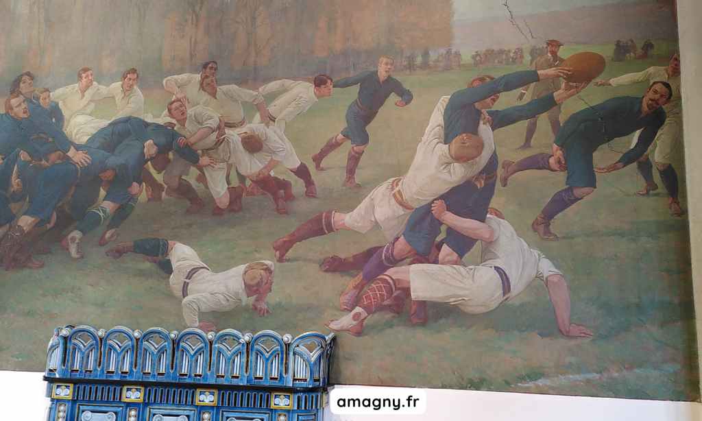 Fresque du lycée Lakanal représentant un match de rugby ancien avec joueurs en pleine action.